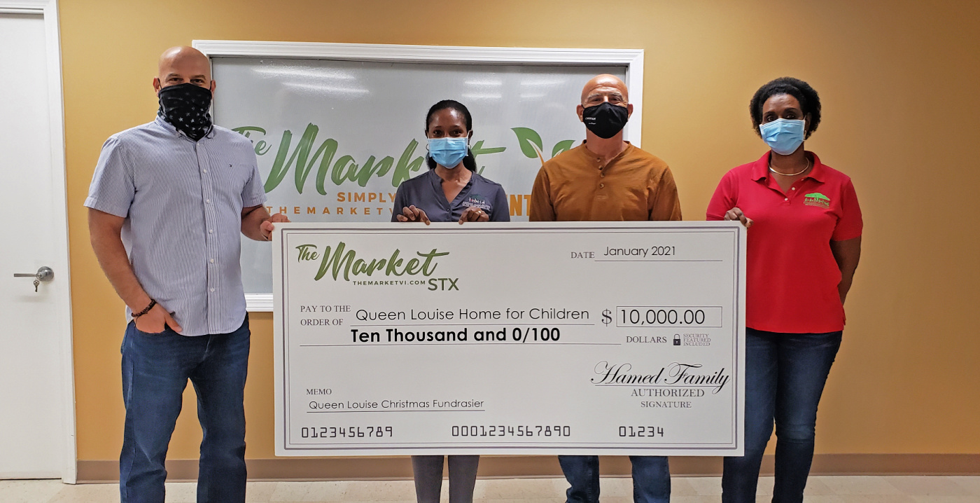 A Giving Community Queen Louise Home Receives Matching Gift Check of